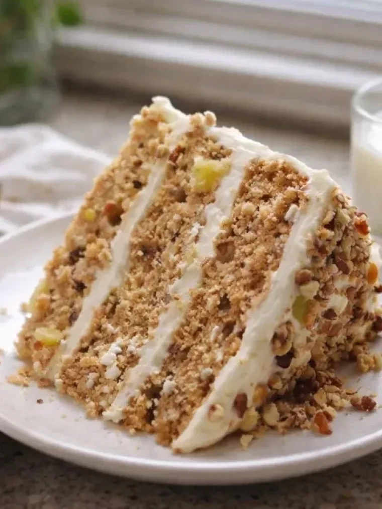 Hummingbird Cake with Cream Cheese Frosting served on a plate and ready to eat